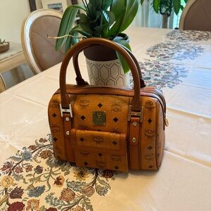 MCM Preowned cognac Leather Bag with Gold embossed hardware.